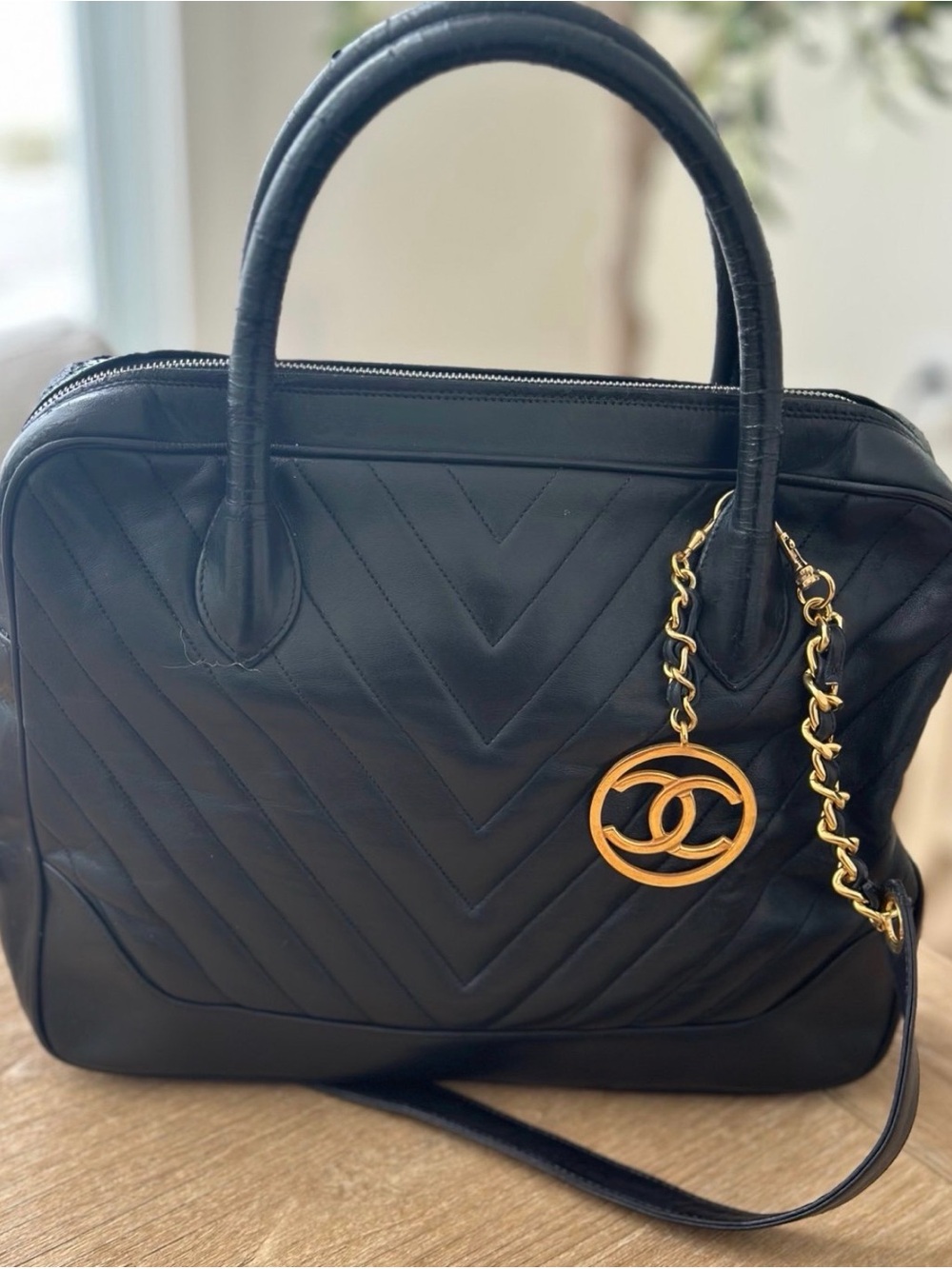 CHANEL Black Quilted Leather Satchel with Gold CC Charm
